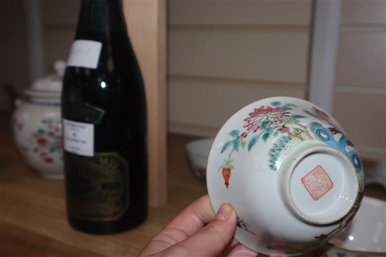 A pair of 20th century Chinese porcelain small bowls, decorated in polychrome with phoenix, and two bowls with covers and stands